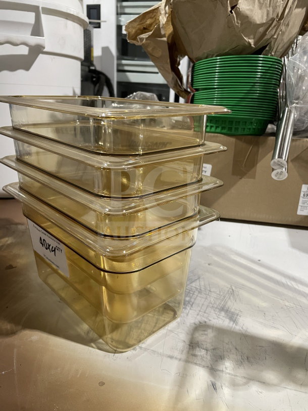 Cambro Polycarbonate Yellow Clear Food Pan, Model 631-1, high heat resistant, stack of four, new condition, commercial use.