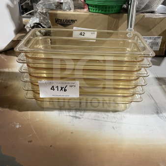 Cambro yellow polycarbonate food pans, model 631-1, stack of six, high heat resistant, commercial-grade, clear with labels.