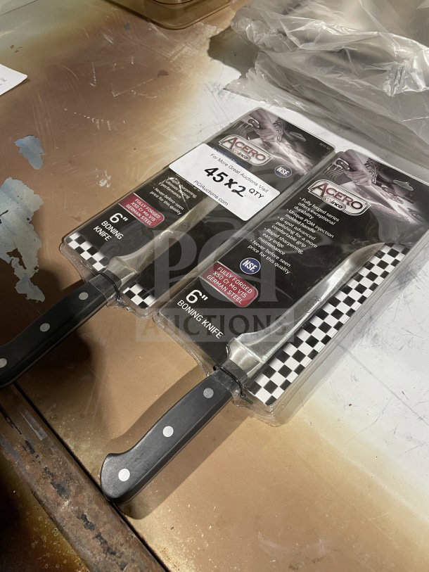 Winco 6" boning knife, model KFP-61, forged carbon steel, POM handle, brand new, in original packaging.