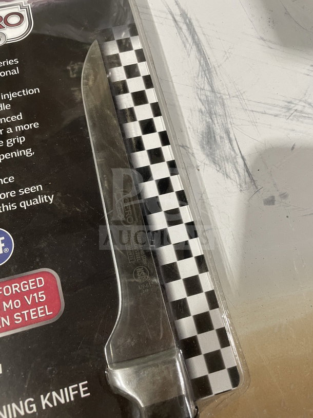 Winco 6" forged carbon steel boning knife, model KFP-61, in original packaging with POM handle and etched blade markings.