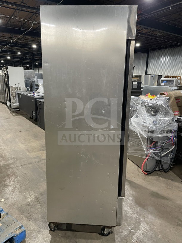 True T-49 commercial stainless steel 2-door refrigerator, Energy Star certified, on casters, poly-coated wire rack included.