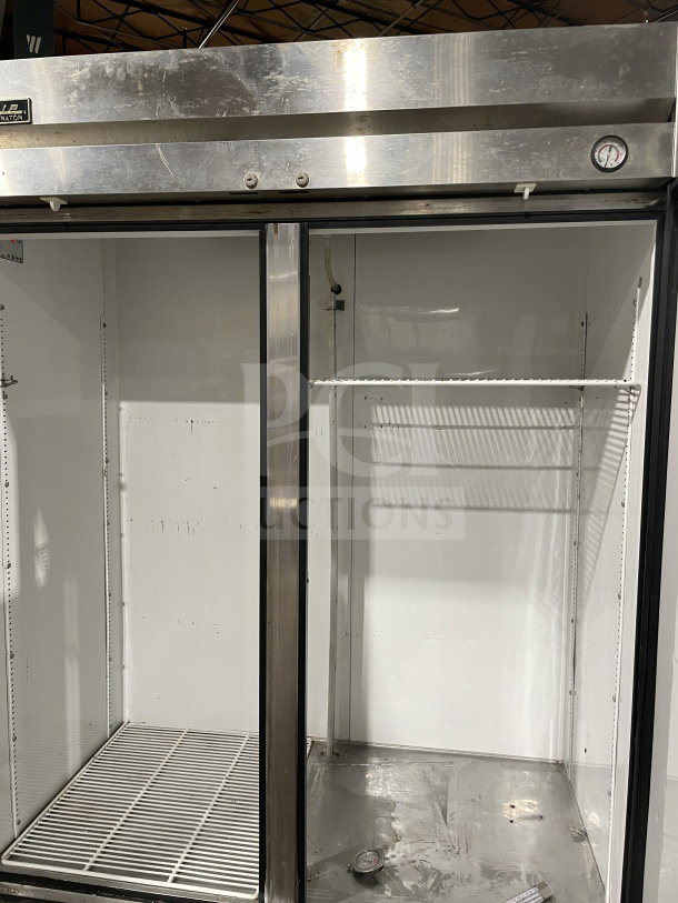 True T-49 commercial 2-door stainless steel refrigerator, Energy Star certified, on casters, with poly coated wire racks, model T-49.