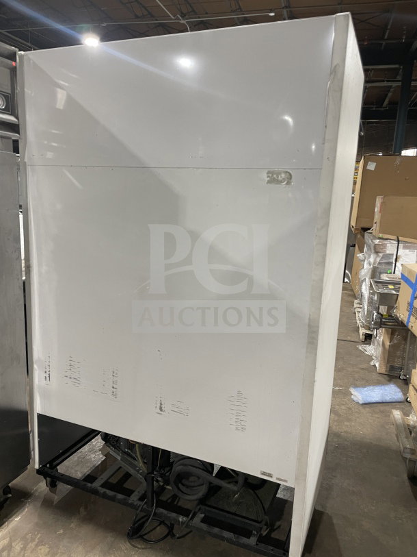True GDM-49 commercial refrigerator, double glass doors, poly-coated wire racks, 115V, 1 phase, on casters, serial 1-3691030.