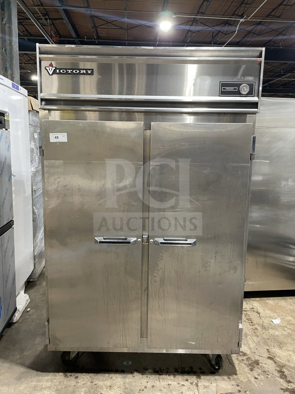 Victory Commercial 2-Door Freezer, Model FAA2057, SN: 09638V100, electric, 115V, on casters, with poly-coated wire rack.