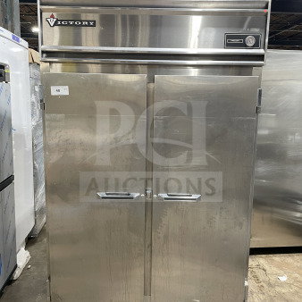Victory Commercial 2-Door Freezer, Model FAA2057, SN: 09638V100, electric, 115V, on casters, with poly-coated wire rack.