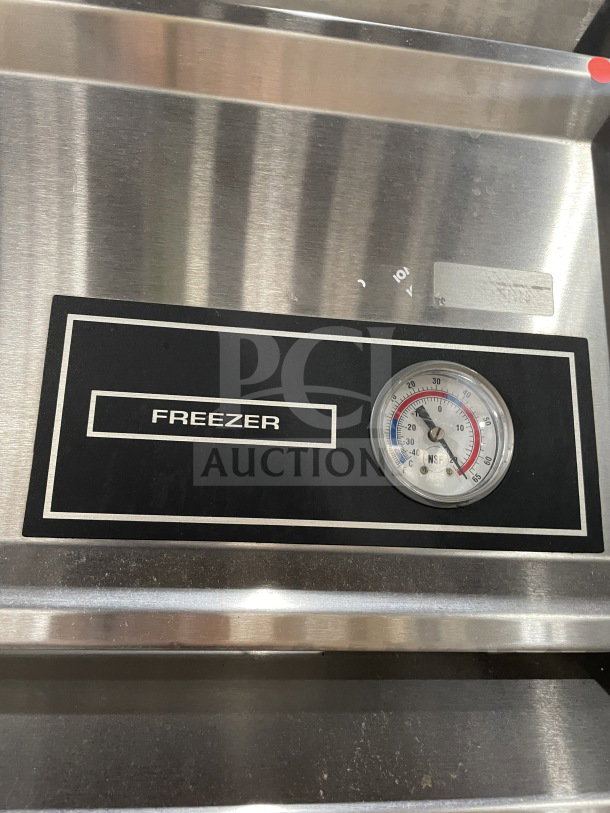 Victory FAA2057 commercial reach-in electric freezer, stainless steel, solid 2-door, poly coated wired rack, 115V, on casters.