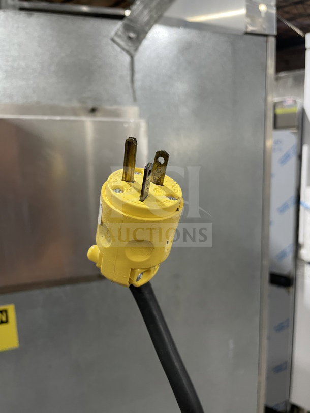 Victory Commercial 2-Door Freezer FAA2057 with casters; visible yellow power plug.