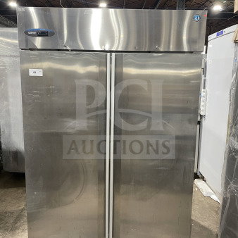 Hoshizaki CR2SFS 2-door stainless steel refrigerator on casters, Energy Star certified, includes poly-coated wire rack.