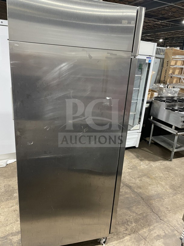Hoshizaki stainless steel 2-door commercial refrigerator, Model CR2SFS, Energy Star certified, on casters, with wired rack.