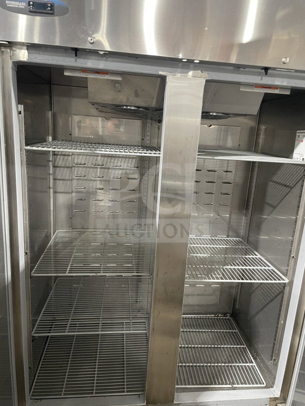 Hoshizaki 2-door stainless steel refrigerator, model CR2SFS, with poly coated racks, Energy Star certified, on casters.