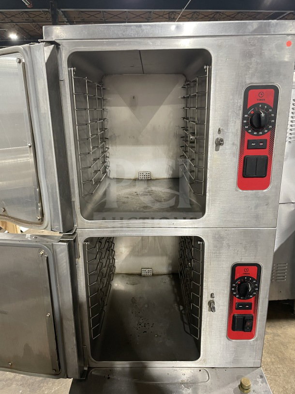 Vulcan C24GA10 stainless steel dual cabinet convection steamer. Natural gas, 120V, 1 phase, on legs. Serial: 463023238.