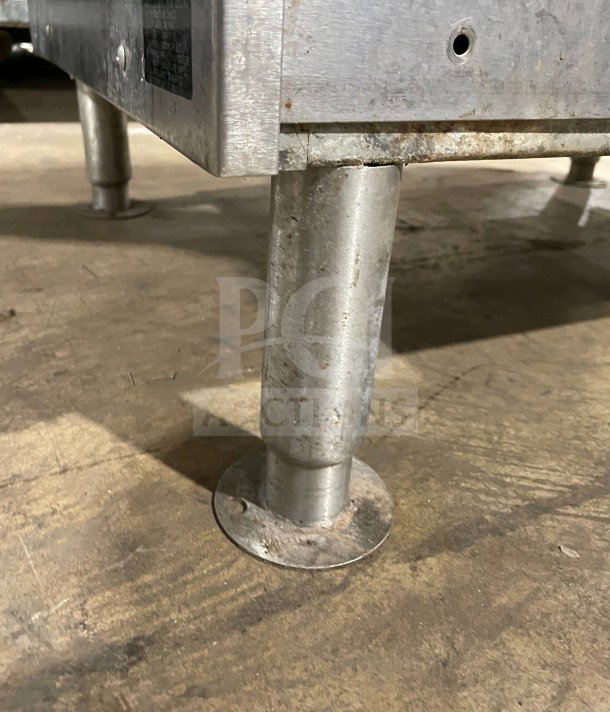 Vulcan C24GA10 commercial stainless steel gas-powered dual cabinet steamer on legs, showing sturdy leg detail. Model SN: 463023238.