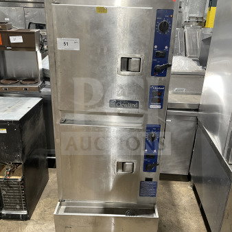 Cleveland Range SteamCraft Ultra-10 Series 24CGA10.2 dual compartment 10-pan gas steamer, stainless steel, with individual control, on legs.