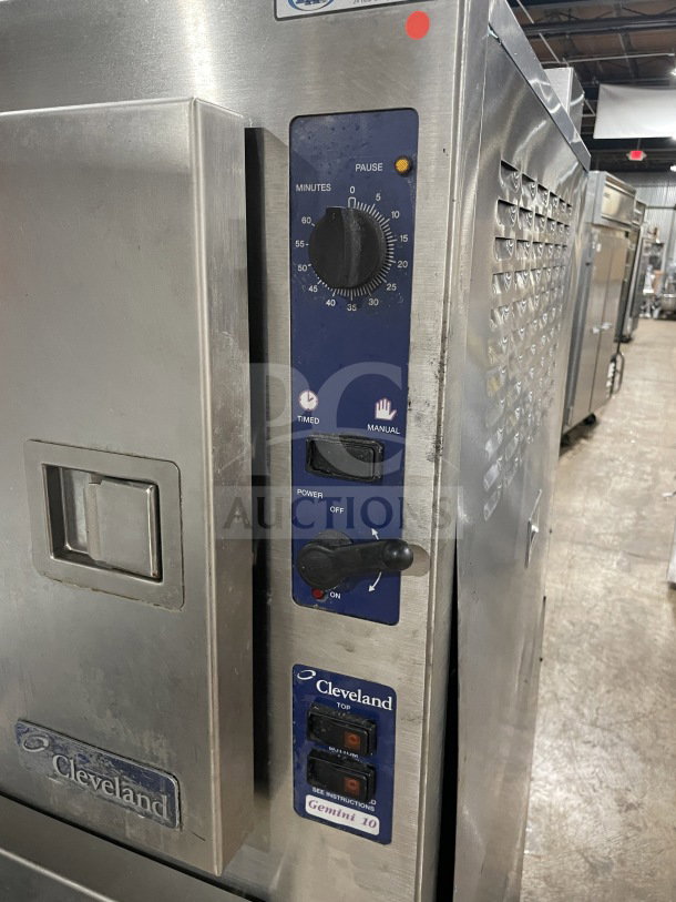 Cleveland Range SteamCraft Ultra-10 convection steamer, model 24CGA102, stainless steel, dual compartment, natural gas, 10-pan capacity, individual controls, on legs, good condition.