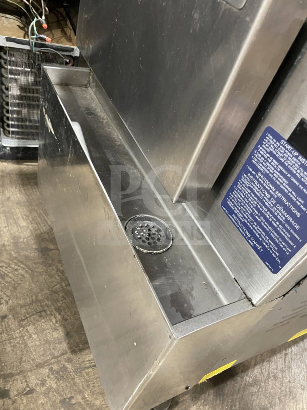 Cleveland Range SteamCraft Ultra-10 stainless steel convection steamer, dual compartment, model 24CGA102, on legs.