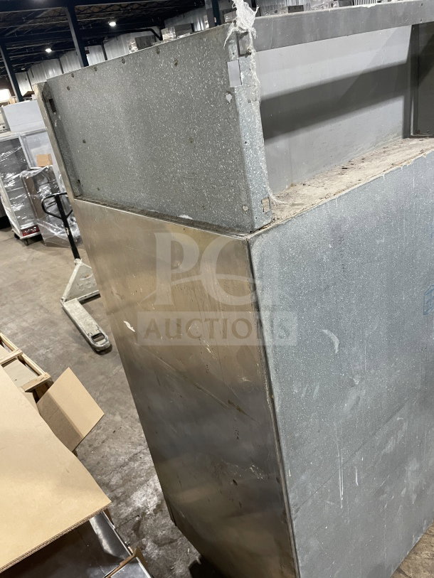 Victory commercial stainless steel 2-door refrigerator. Features Power Cool analog control. On legs, visible wear on exterior.