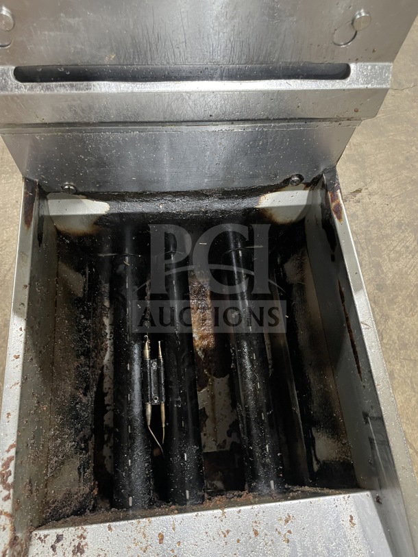 CoolerDepot CTF3 commercial stainless steel deep fryer, natural gas, with backsplash, basket hanger, and legs. Shows interior detail.