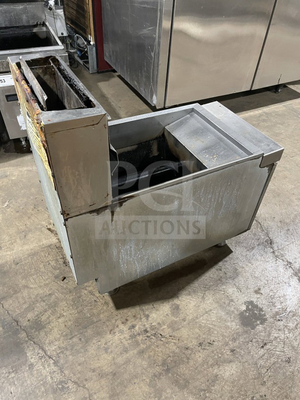 CoolerDepot CTF3 commercial stainless steel gas fryer, includes backsplash and basket hanger. Visible wear, on legs.