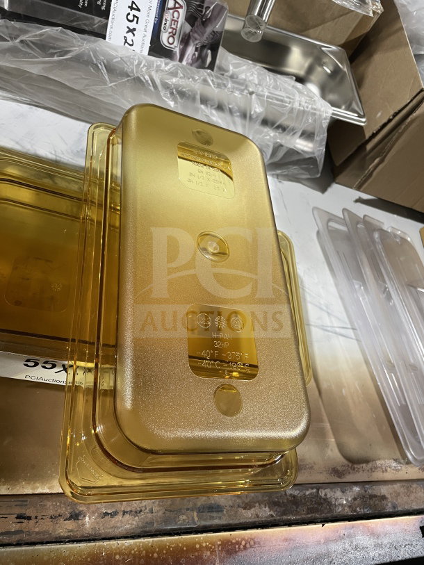 Brand new amber food storage container, labeled "H-Pan 32HP," temperature range -40°F to 375°F, ideal for kitchen use.