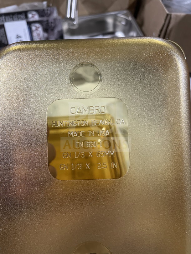 Gold Cambro container, brand new, embossed label: "Cambro, Huntington Beach, CA, Made in USA, GN 1/3 x 65mm, 2.5 in."