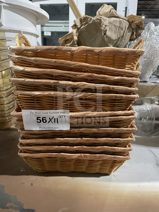 Commercial polypropylene synthetic wicker display basket, stack of 11. Sturdy construction, ideal for retail use. Label shows "56X11 QTY".
