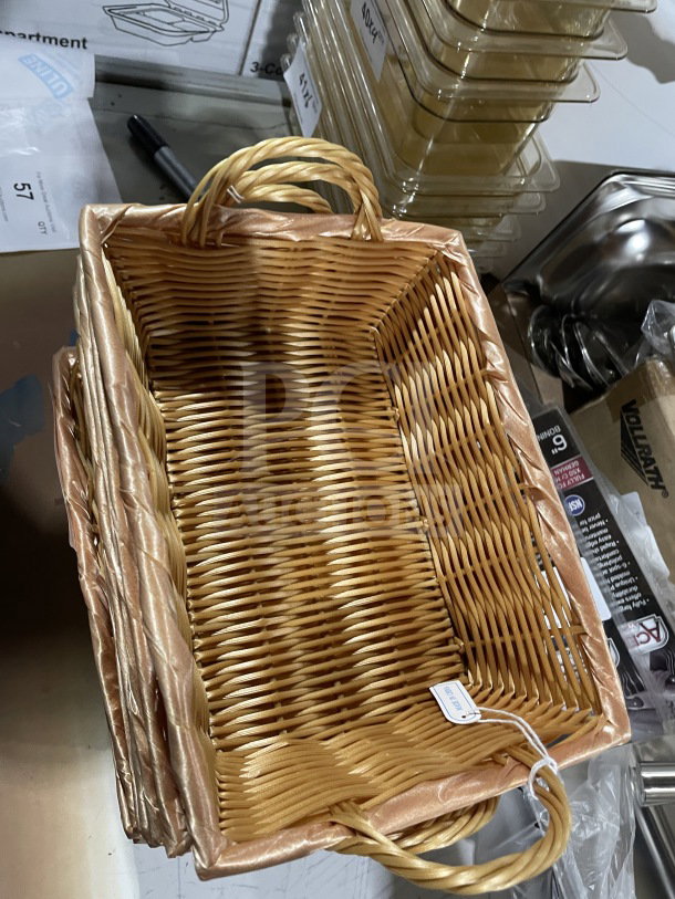 Commercial synthetic wicker display basket in polypropylene, rectangular shape, with handles. Appears in good condition.