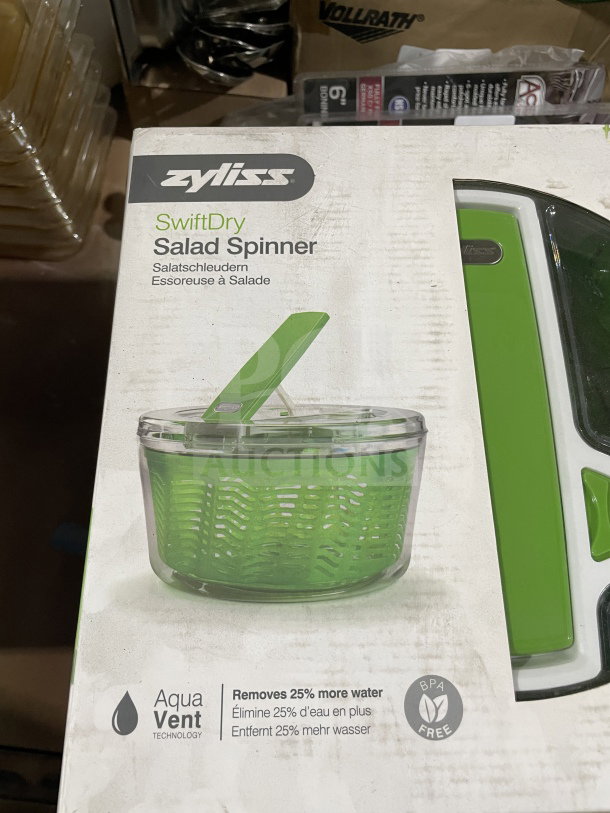 Zyliss SwiftDry Salad Spinner in packaging, featuring AquaVent tech, removes 25% more water, BPA-free, new condition.