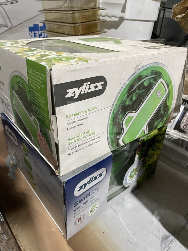 BRAND NEW Zyliss SwiftDry Series Salad Dryer in box. Features fast spinning action and single-handed use. BPA free.