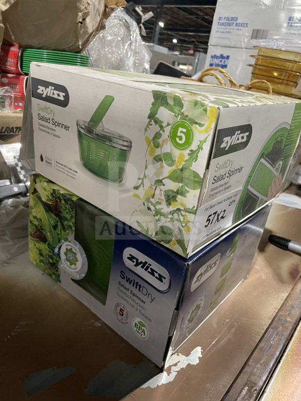 Brand new Zyliss SwiftDry Series salad spinner in a box. Green design, BPA-free, 5-quart capacity, commercial grade.