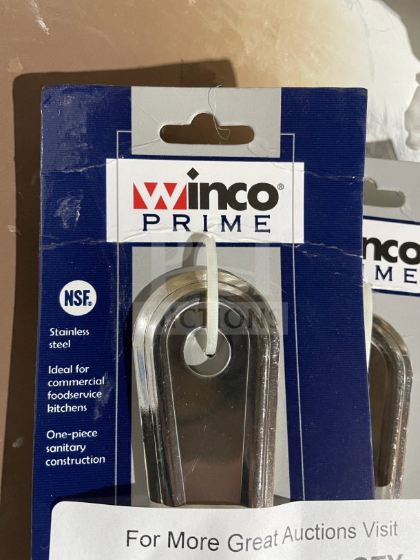 Winco stainless steel perforated buffet spoon, model BSSN, new in packaging. Ideal for commercial kitchens, NSF certified.
