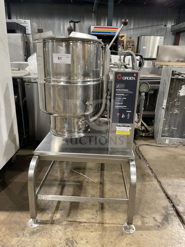 Groen TDH-48 commercial stainless steel tilting soup kettle on stand; natural gas powered, 120V 1Phase, model SN: 93724.