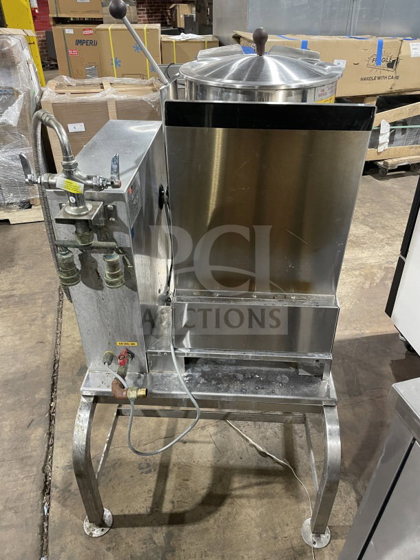 Groen TDH-48 stainless steel tilting soup kettle on stand. Natural gas powered, 120V 1Phase, SN: 93724. Good condition.