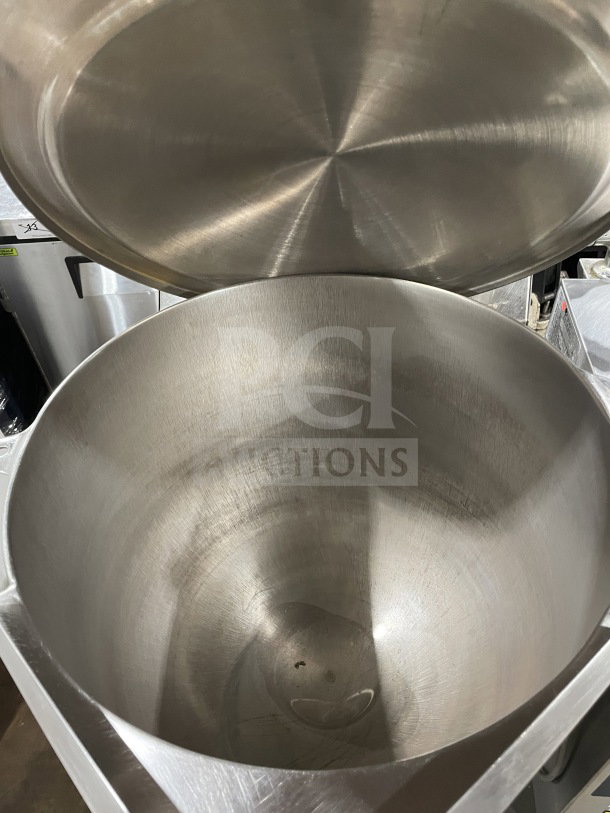 Groen TDH-48 stainless steel tilting soup kettle on stand, natural gas powered, 120V, 1-phase, on legs, serial 93724.