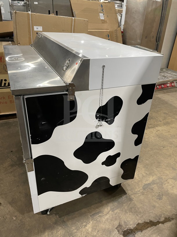 Beverage-Air SMF49Y stainless steel electric milk cooler, cow pattern, 115V, 1 phase, used condition, single-sided access.