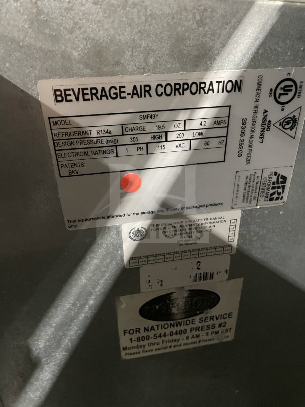 Beverage-Air SMF49Y commercial milk cooler label, showing model, refrigerant specs, electrical ratings, and service details.