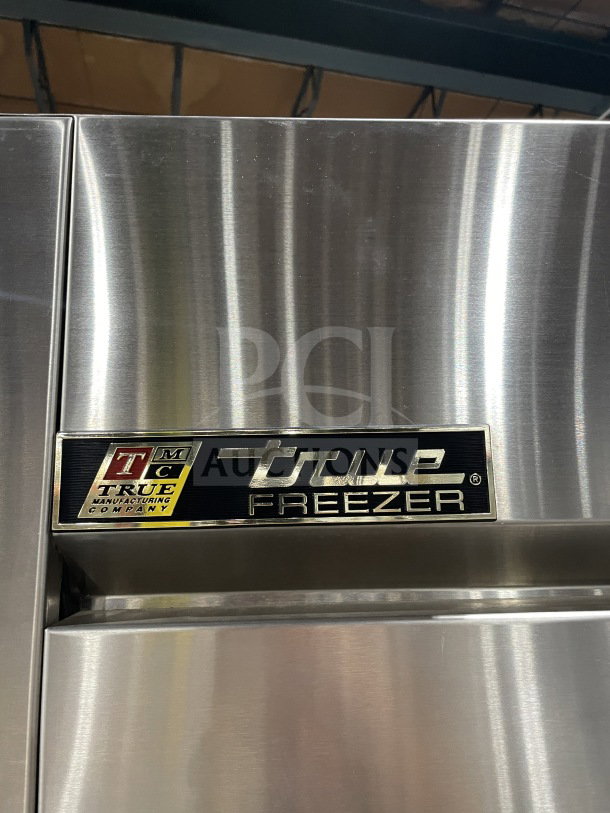 True 78" Commercial Stainless Steel Spec Series Freezer model TR3F-3S, with chrome plated wired rack, on casters.