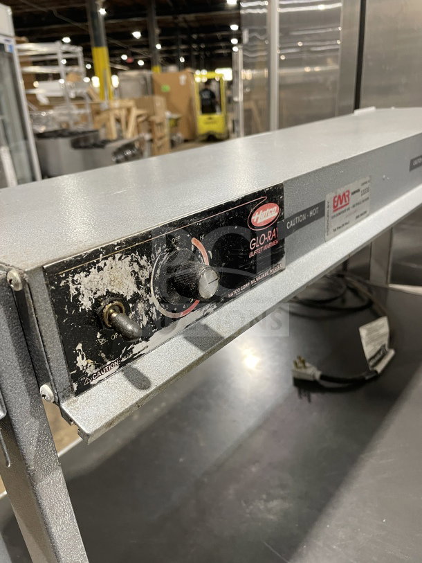 Hatco GRBW-36 stainless steel electric buffet warmer. Features control dial, power switch, visible wear. Model SN: 2120880551.