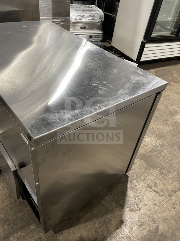 True commercial stainless steel 2-door undercounter refrigerator, model TUC-48-LP-HC~SPEC3, on casters, Energy Star certified.