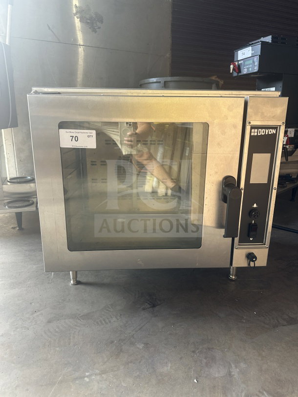 Doyon DCOT5 stainless steel countertop convection oven, electric, half size, 208V, 1 phase, on legs, visible control panel.