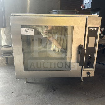 Doyon DCOT5 stainless steel countertop convection oven, electric, half size, 208V, 1 phase, on legs, visible control panel.