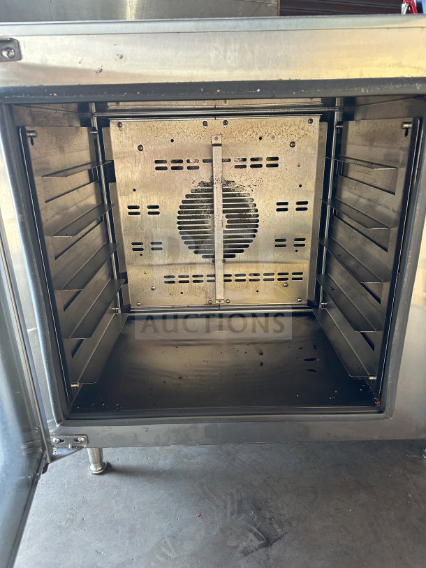 Doyon DCOT5 countertop convection oven, stainless steel, electric, on legs, viewed open. Model DCOT5, SN 070190130321.