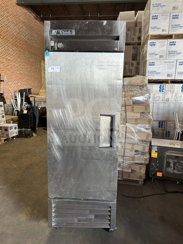 True T-23F commercial stainless steel single door reach-in freezer, Energy Star certified, with poly-coated wired rack, on casters.