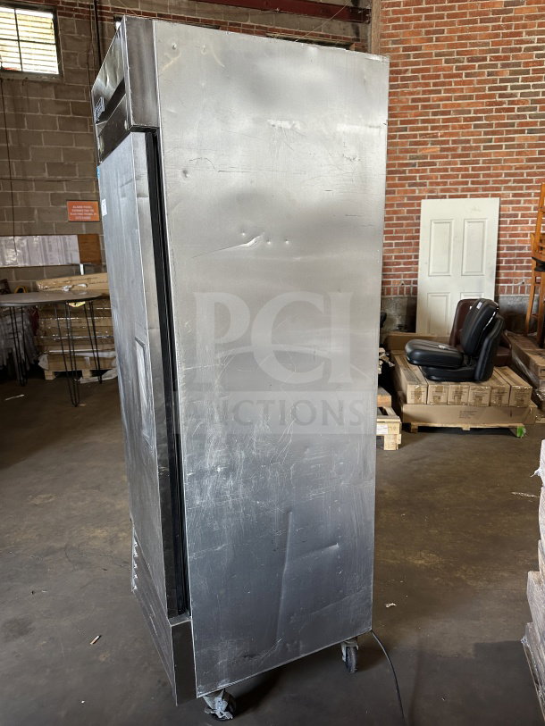 True T-23F stainless steel reach-in freezer with single door, Energy Star certified, on casters, with poly-coated rack.