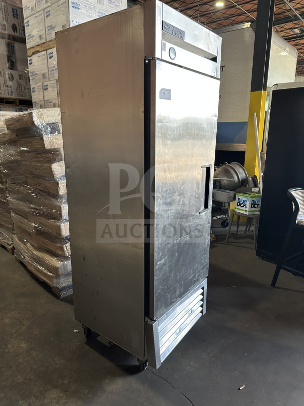 True T-23F commercial stainless steel single door reach-in freezer, Energy Star certified, on casters, with poly coated wired rack.