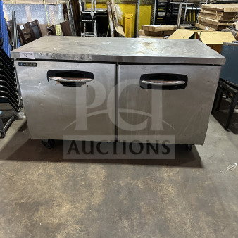 Master Bilt Fusion Series UF60 2-Door Stainless Steel Undercounter Freezer with Poly Coated Wire Racks, on Casters.