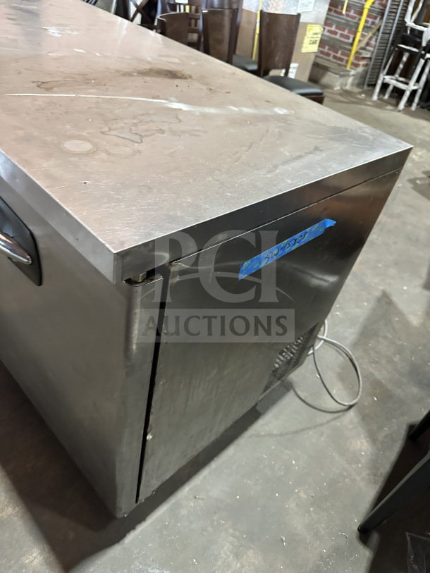 Master Bilt UF60 stainless steel 2-door undercounter freezer, poly coated wire racks, casters, 115V, used condition.