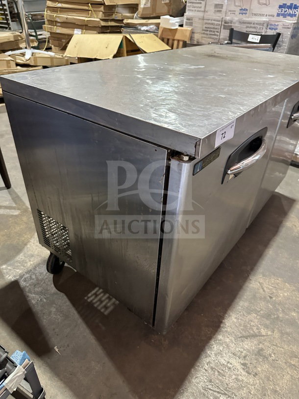 Master Bilt UF60 Fusion Series stainless steel 2-door undercounter freezer, with poly coated wire racks, on casters.