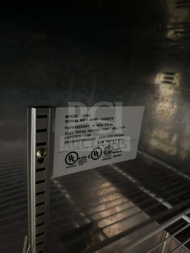 Master Bilt UF60 2-Door Undercounter Freezer with poly coated wire racks, stainless steel, on casters. 115V, 1 Phase.