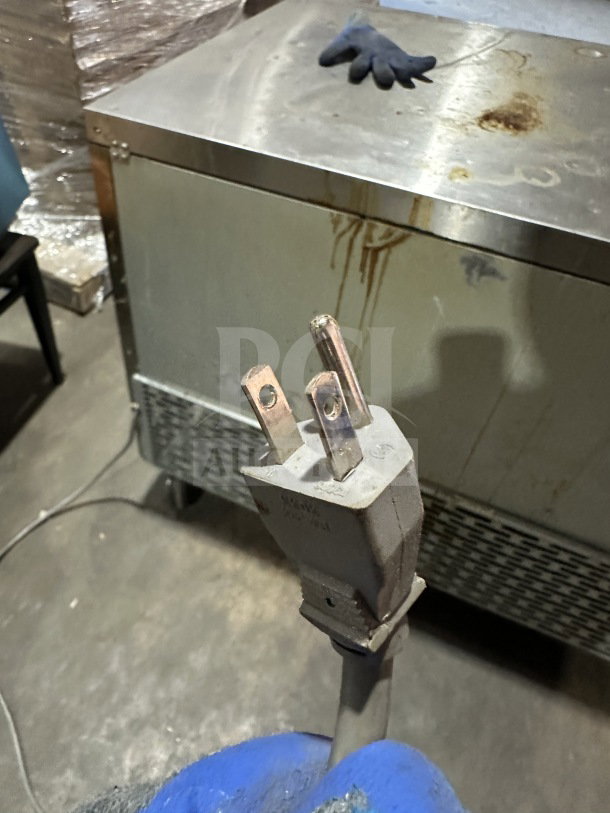 Master Bilt Fusion Series UF60 commercial stainless steel 2-door undercounter freezer on casters, 115V, visible plug.