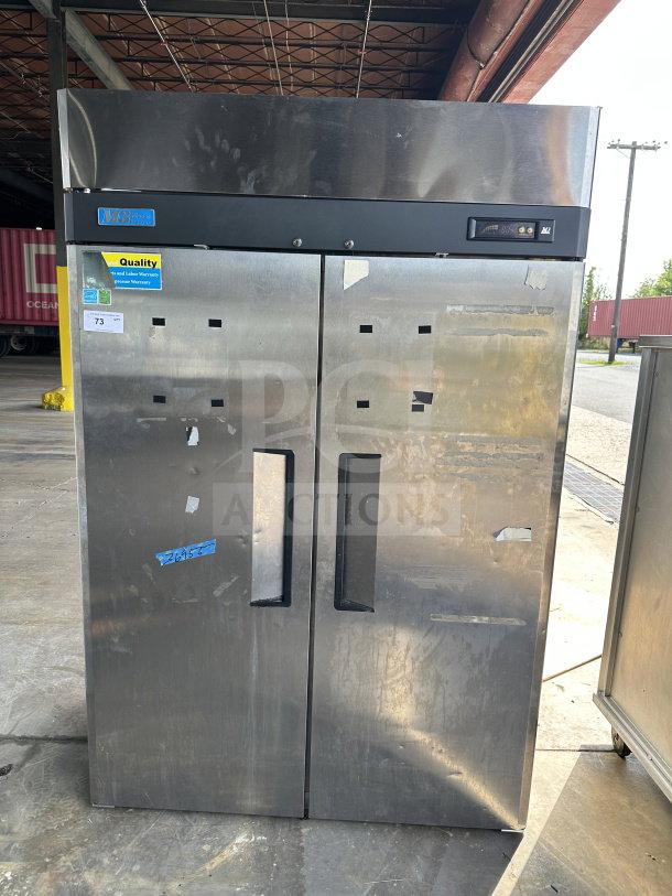 Turbo Air M3F47-2 commercial stainless steel 2-door reach-in freezer with poly coated racks, Energy Star certified, on casters.